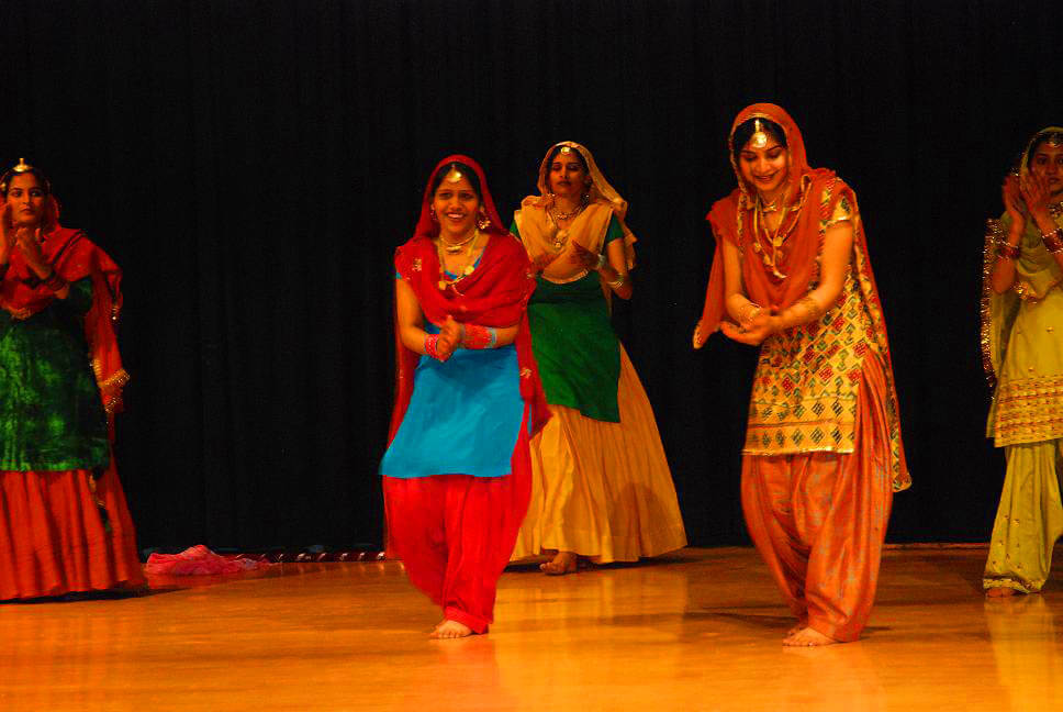 Traditional Giddha folk dance performance by women with phulkari